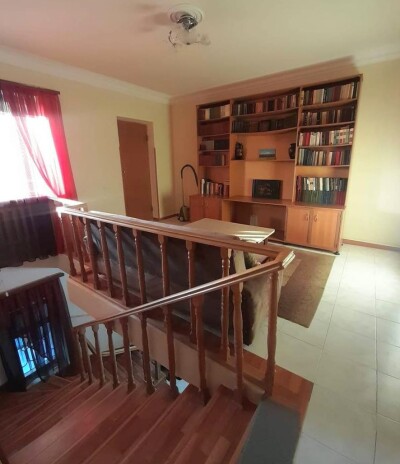 Code AE-8809, a house for sale.