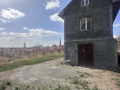 Code KS-9502. A plot of land is for sale.